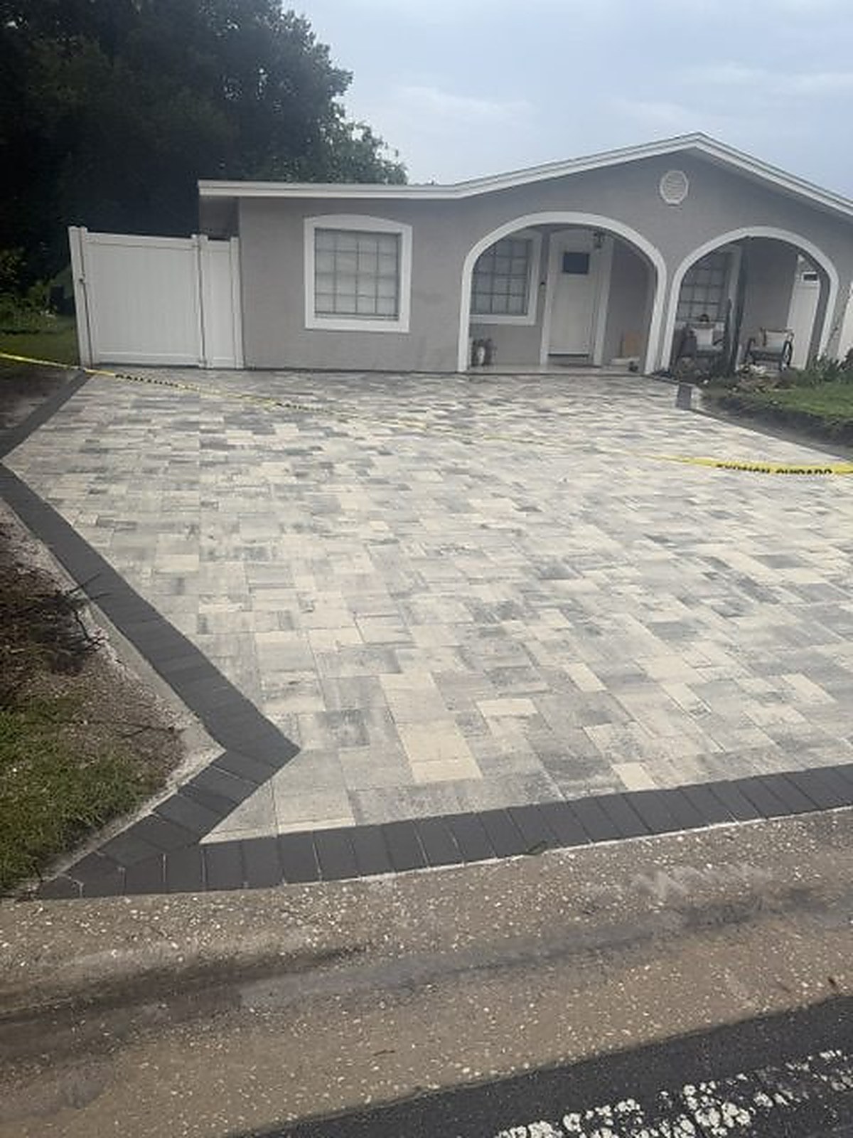 Paver driveway with contrasting border at a Tampa home